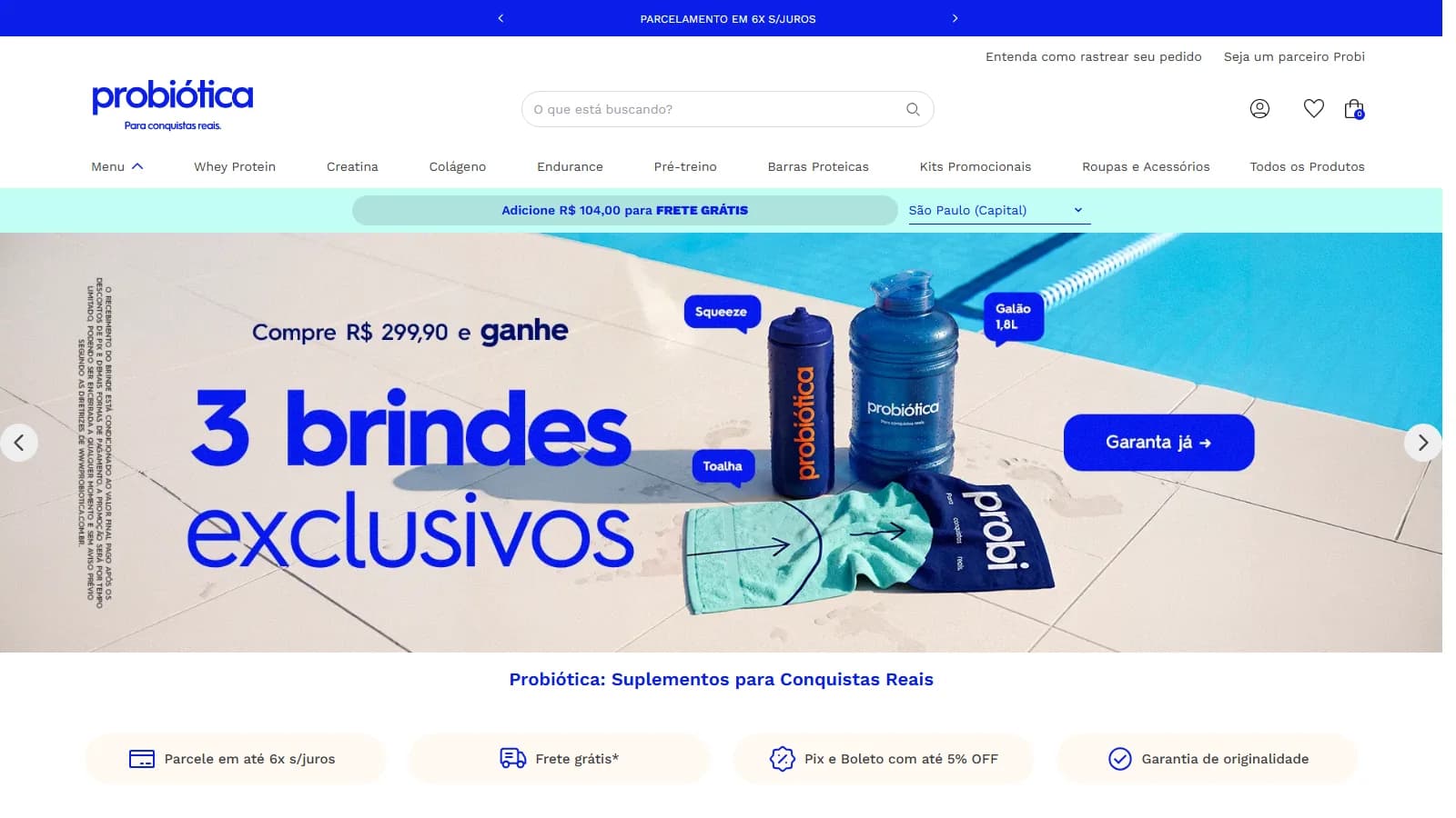 Página inicial do site da Probiótica em 14/10/2026, com o banner Compre R$ 299,90 e ganhe 3 brindes exclusivos (squeeze, galão de 1,8 L e toalha)