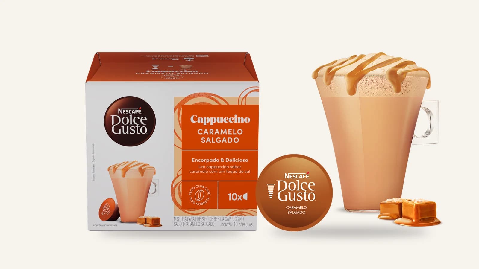 Caixa do NESCAFÉ Dolce Gusto Cappuccino Caramelo Salgado com 10 cápsulas ao lado de uma xícara da bebida pronta