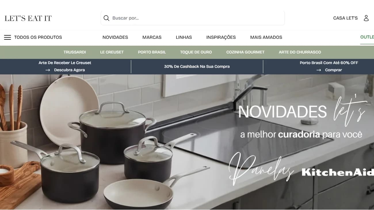 Página inicial da loja Let's Eat It com o menu de marcas e linhas, o banner de cashback e uma vitrine de panelas