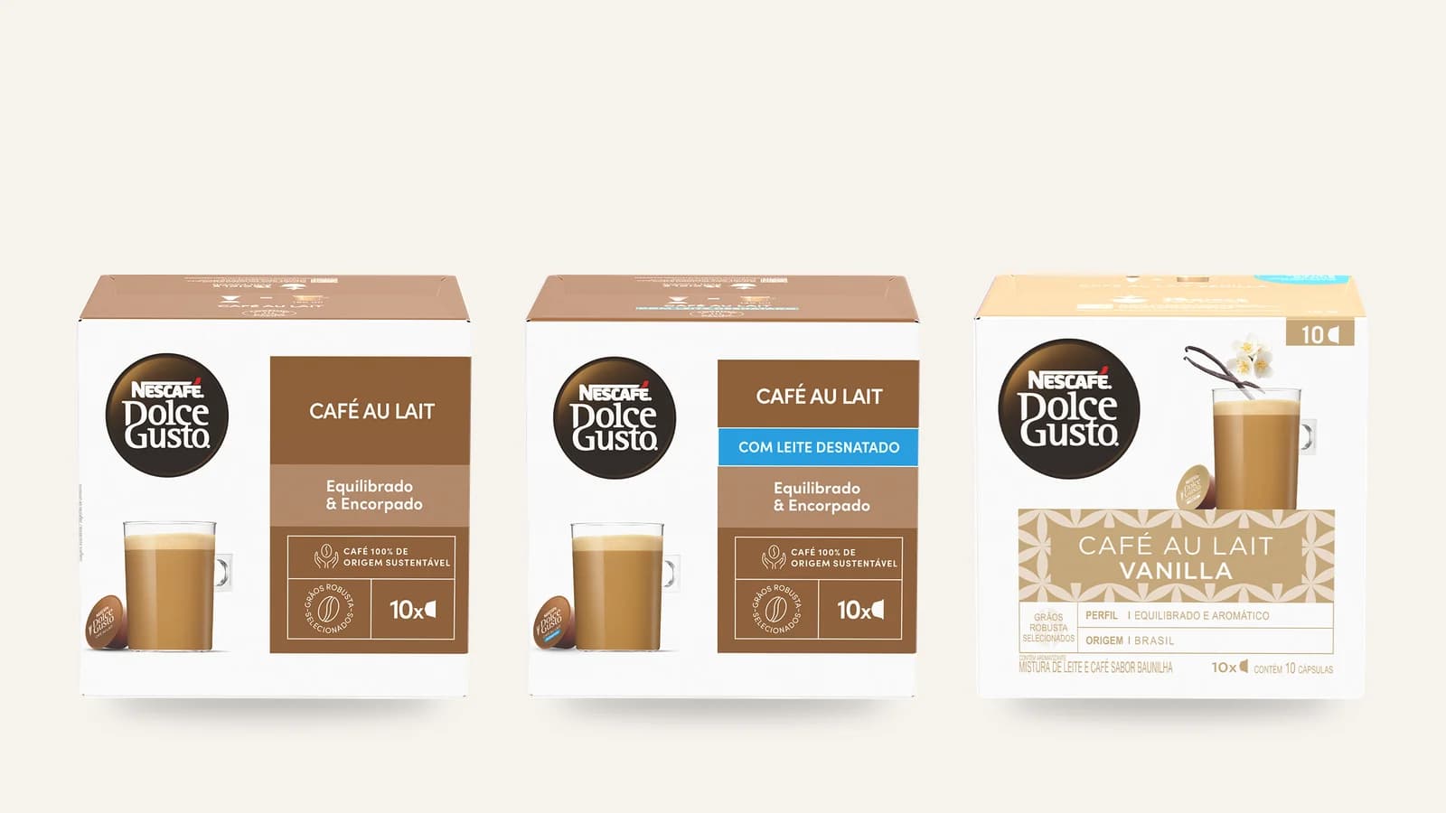 Caixas de cápsulas NESCAFÉ Dolce Gusto Café au Lait, Café au Lait com leite desnatado e Café au Lait Vanilla, lado a lado